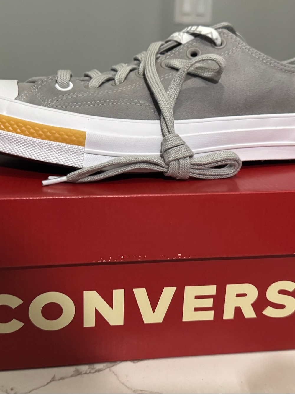 Converse Gray Low-Top Sneakers with White Sole and Yellow Accent